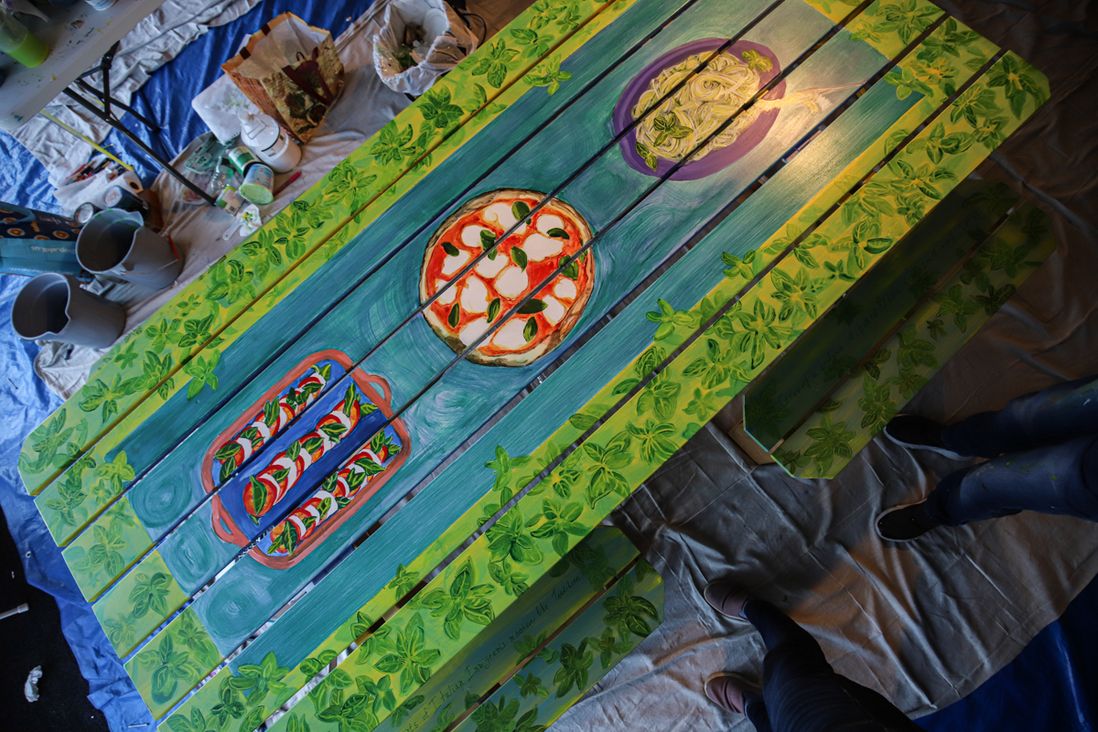 Wooden tables decorated by artists